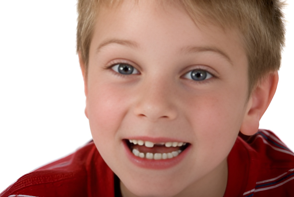 boy with missing teeth, smiling