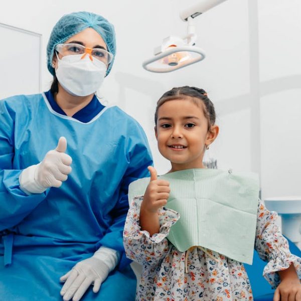 a child and her dentist